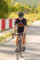 HOLOKOLO Kurzarm Radtrikot und Shorts - HYPER - Schwarz/Regenbogen